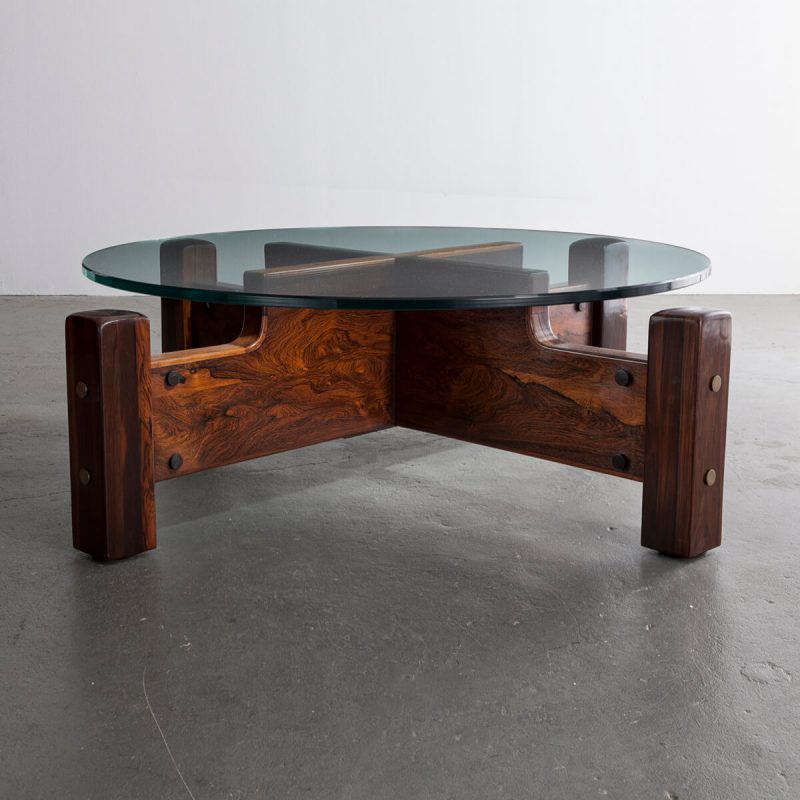 Large round coffee table in solid imbuia with a glass top