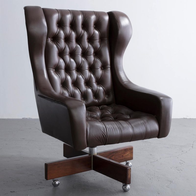 Kennedy swivel office chair with tufted brown leather upholstery and solid hardwood base.